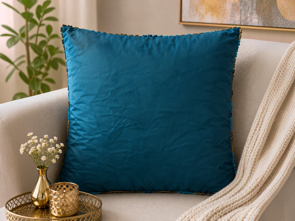 Jagdish Store decorative cushion cover with teal, turquoise, and bronze fabric ribbons in concentric circles.