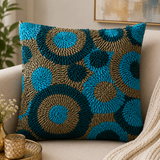 Jagdish Store decorative Cusion cover with teal, turquoise, and bronze fabric ribbons in concentric circles.