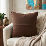 Jagdish Store turquoise cushion cover with a brown triskele spiral pattern and matching border.