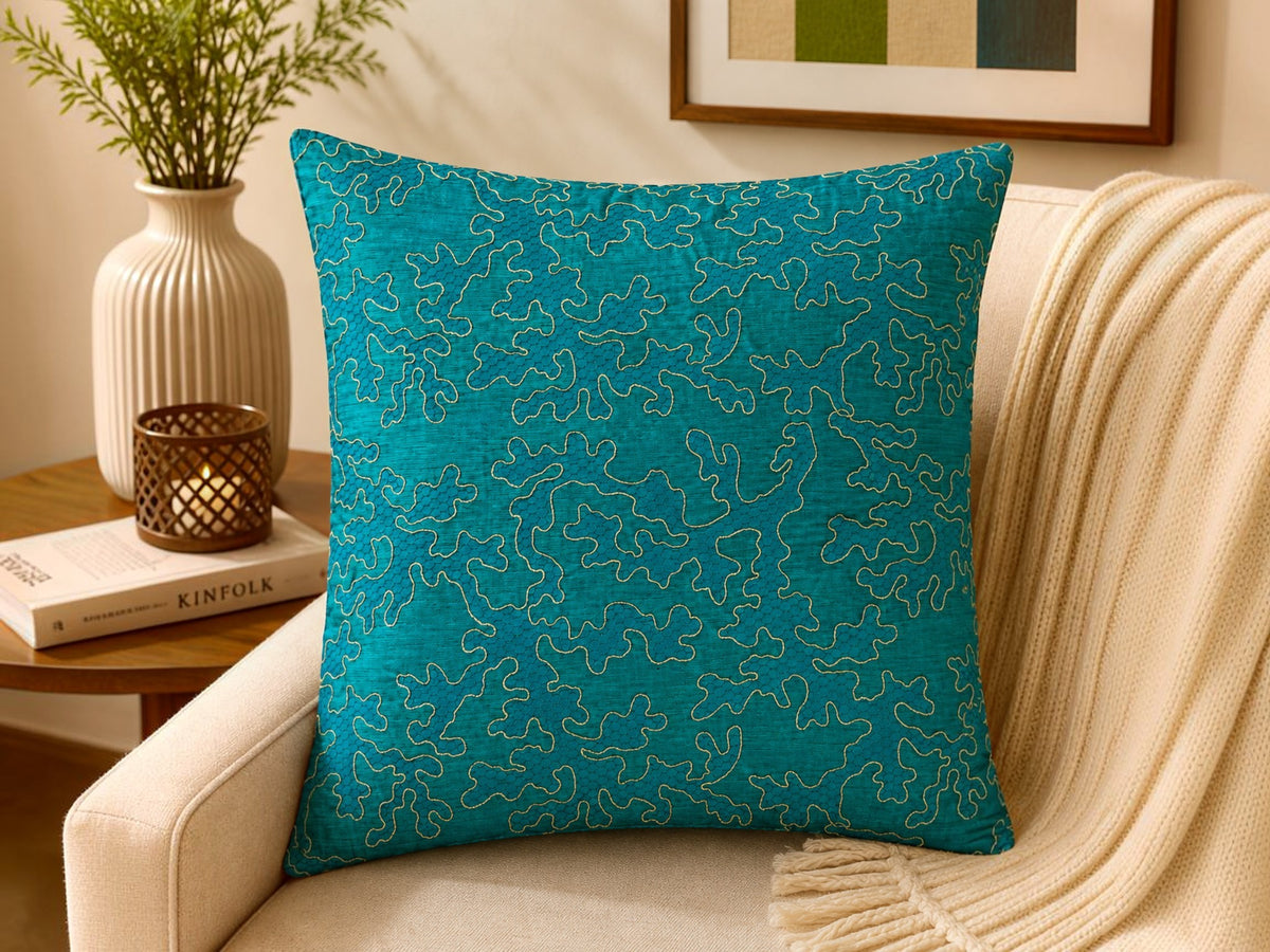 Teal blue patch work polysilk cushion cover with decorative stitched pattern