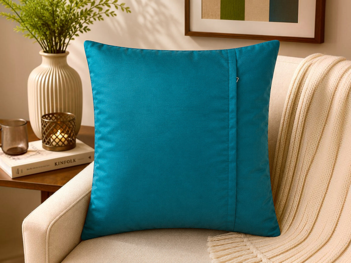 Teal blue patch work polysilk cushion cover with decorative stitched pattern