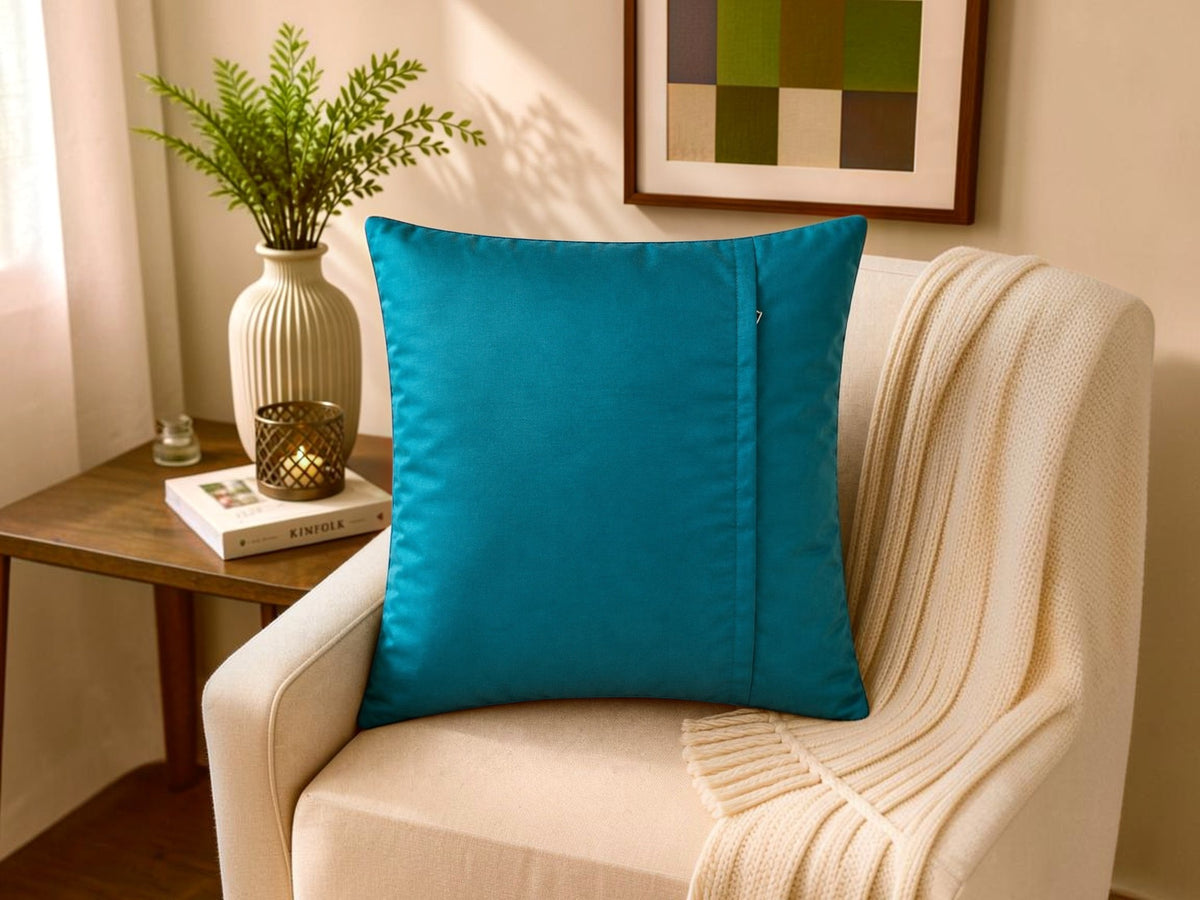 Blue polysilk cushion cover with red floral rose print on dark blue background