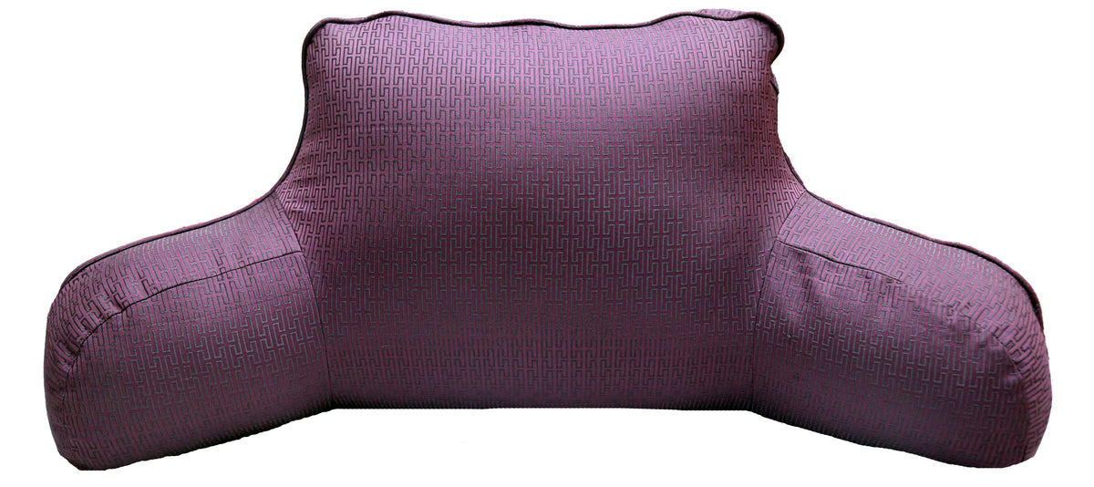 Close-up of the plum back cushion cover in a black Greek key jacquard weave
