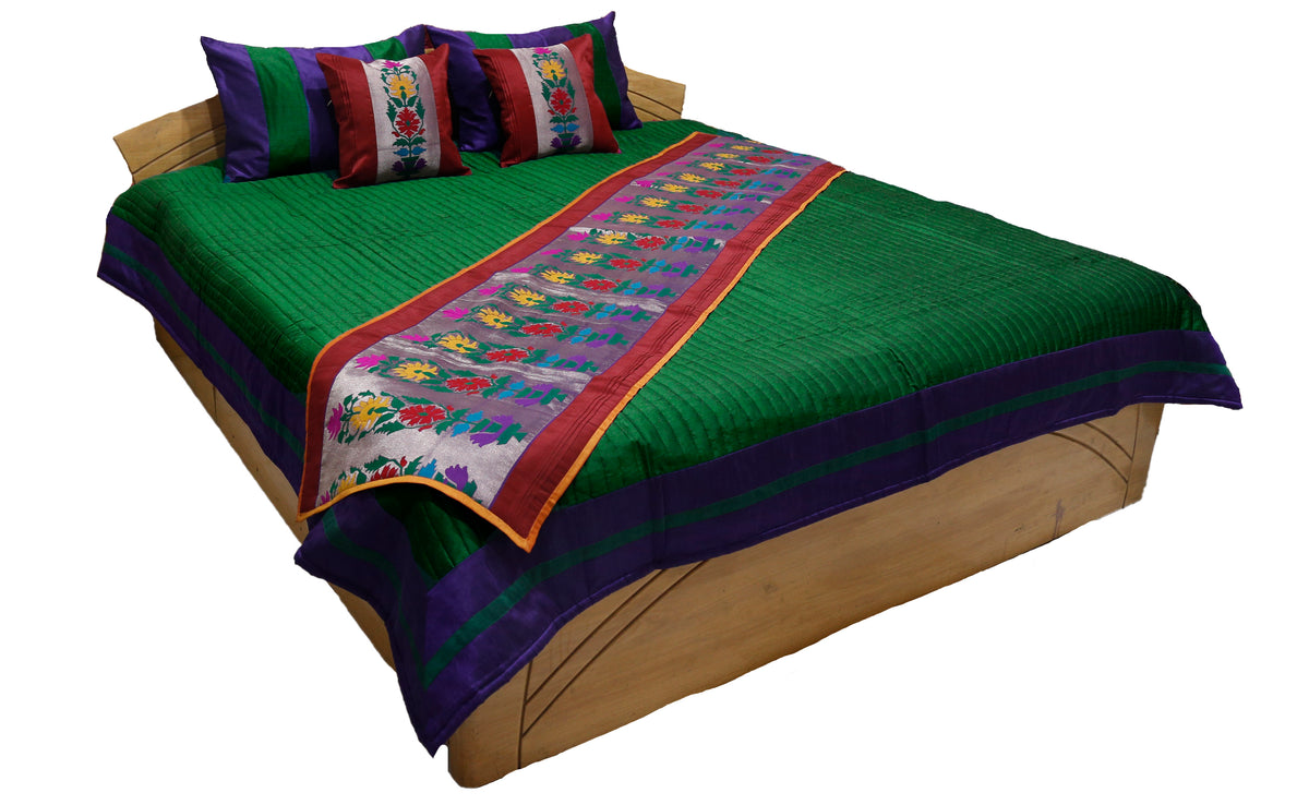 Same bedcover shown reversed to its green side, confirming genuine two-tone reversibility
