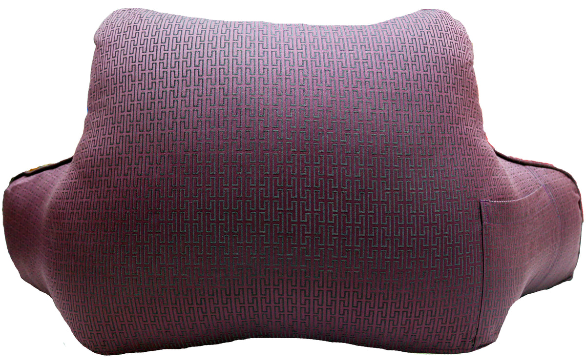 Plum Greek key jacquard back cushion filling the frame, showing the woven fret
