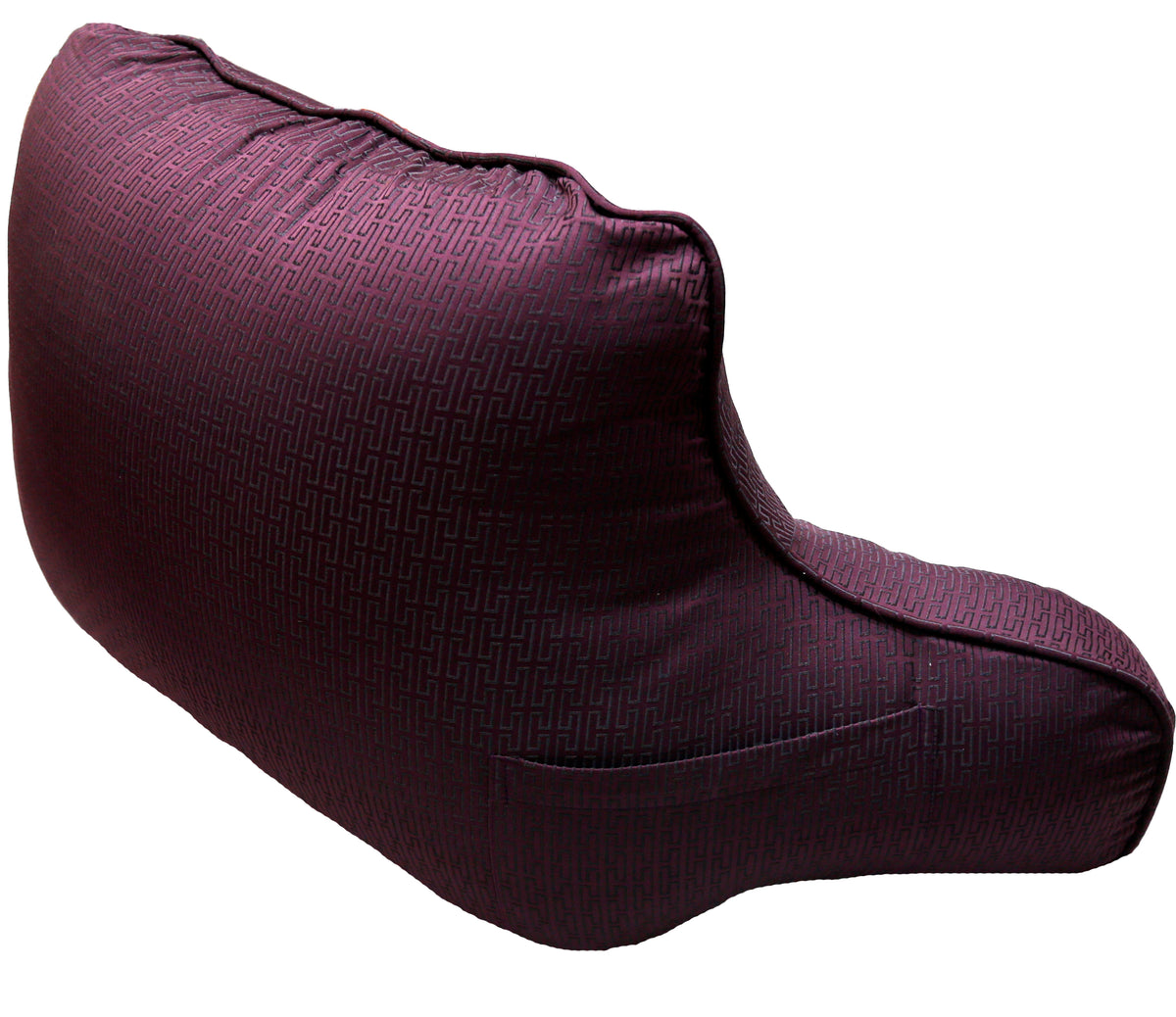 Shaped plum jacquard back support cushion seen from the side, with piped edge