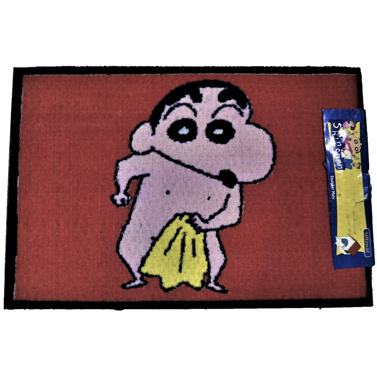 Red kids play mat with a cartoon boy holding a yellow towel, shown flat with retail tag, 45x75 cm