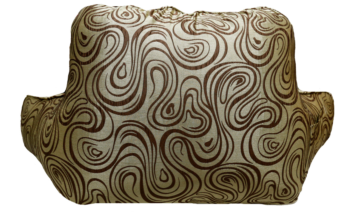 Same gold and brown swirl-print bedrest cushion, back view