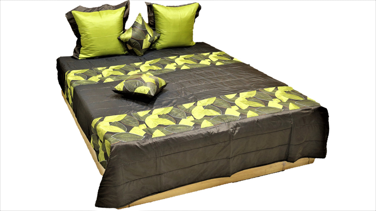 Charcoal brown quilted bedcover set with lime green leaf motifs and lime pillow covers