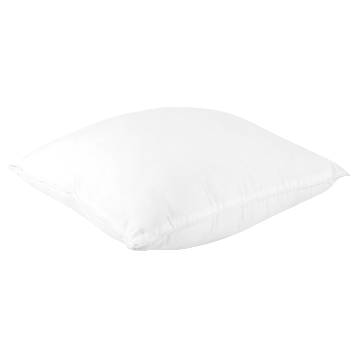 White polyfill cushion insert resting on its side, showing the loft of the filling