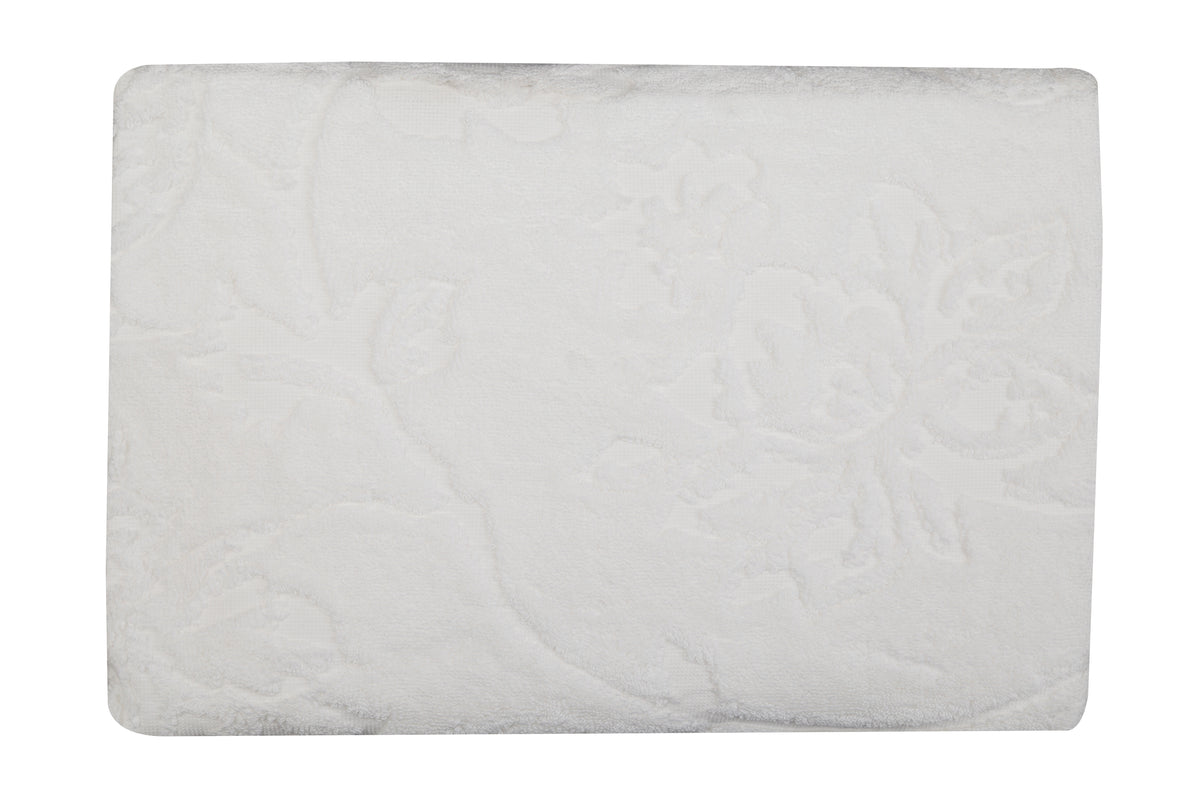 White cotton beach towel, close-up view of the textured terry fabric
