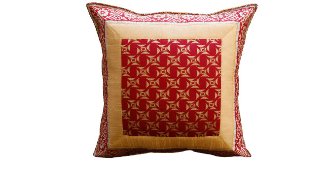 Maroon and gold geometric medallion art silk cushion cover with a gold silk border