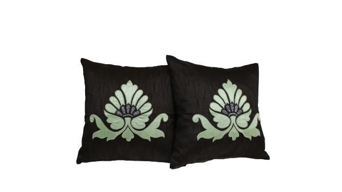 Two black cushion covers with pale green lotus appliqué, Bal Patch