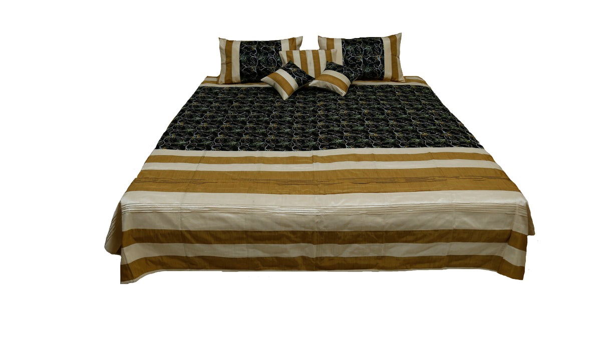 Black, cream and gold banded bedcover with aari-embroidered shams
