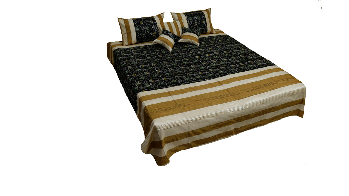 Black and gold banded aari embroidery bedcover made up on a double bed