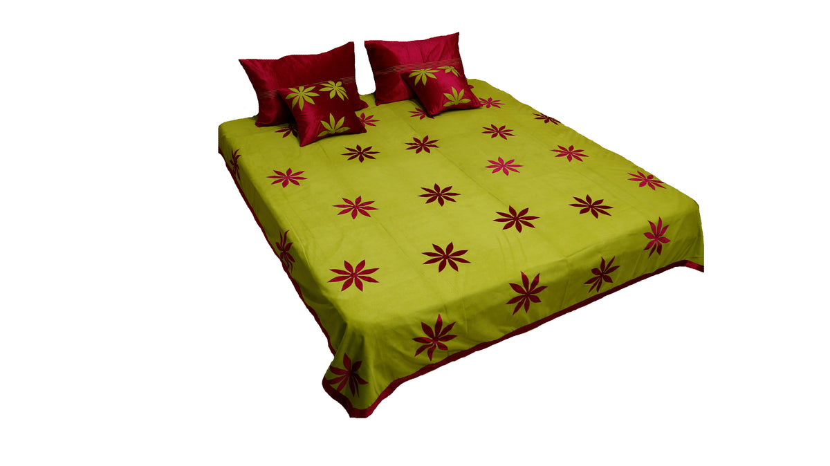Lime green appliqué flower bedcover made up on a double bed, Sued
