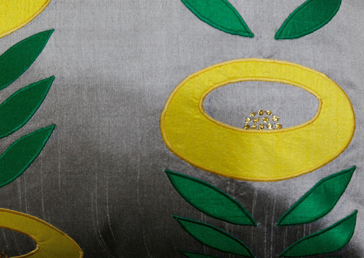 Close-up of the yellow ring-flower applique