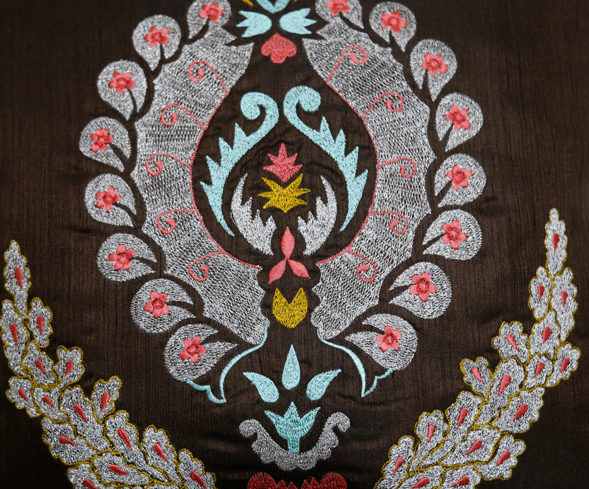 Close-up of the damask medallion embroidery