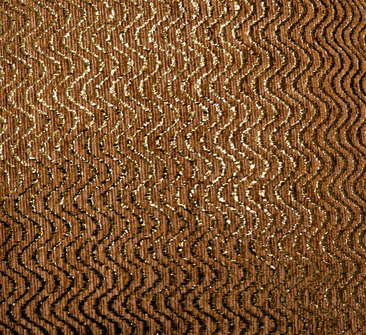 Close-up of the gold lurex wavy chevron weave