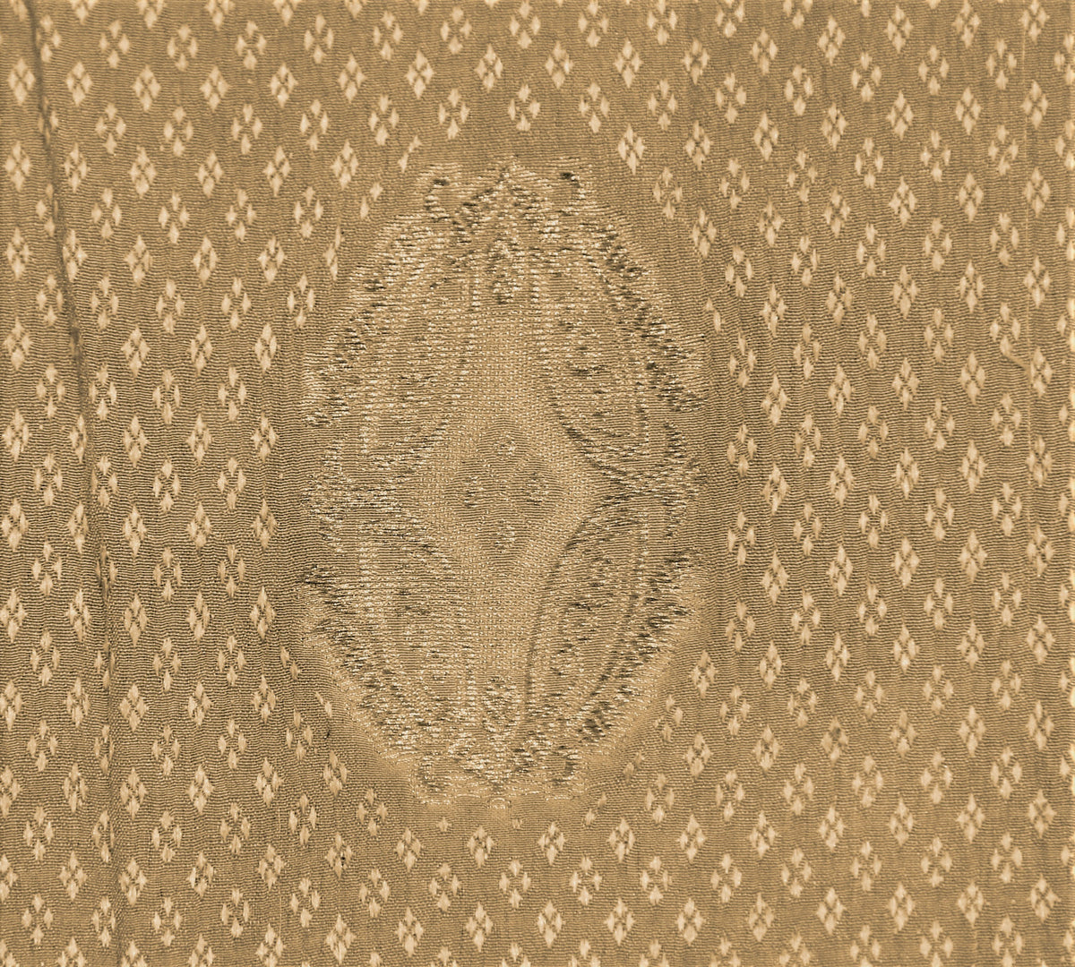 Gold silk upholstery fabric with a tone-on-tone diamond-dot jacquard and medallion motif