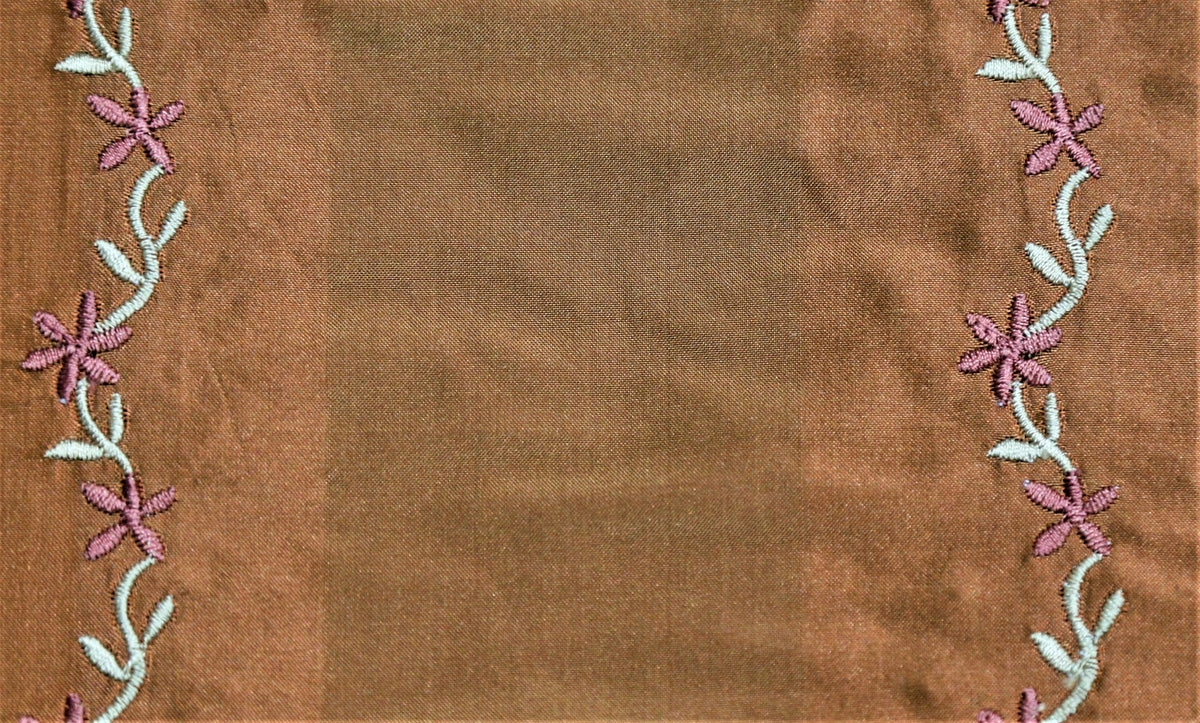 Secta plain silk upholstery fabric swatch in copper rust