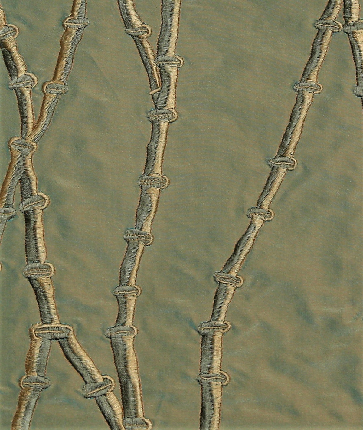 Sage-green silk upholstery fabric with a tone-on-tone embroidered bamboo-stem motif