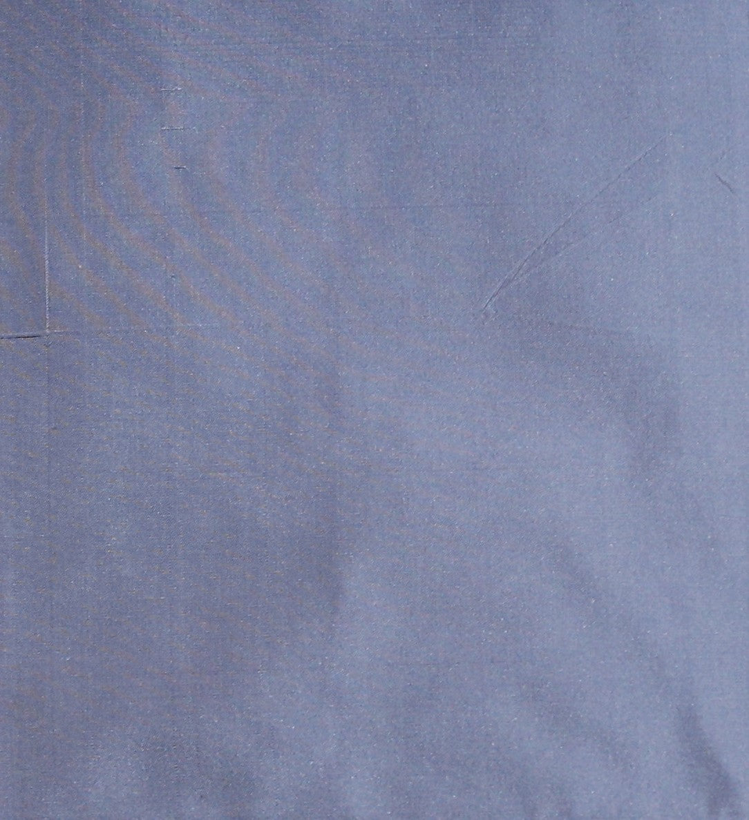 Dusty blue-lavender silk upholstery fabric in a plain, even colour