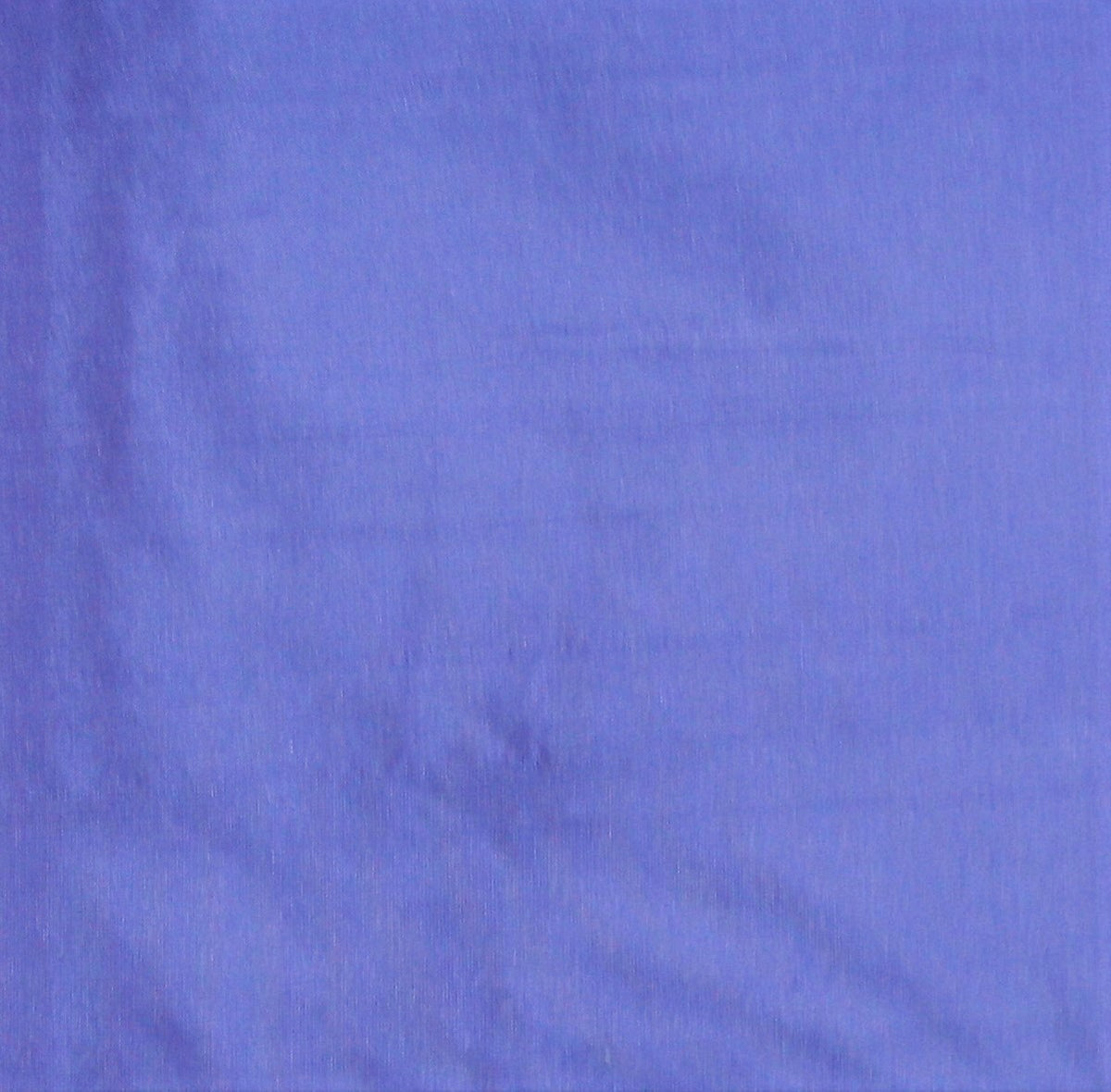 Periwinkle blue-violet silk upholstery fabric in a plain, even colour