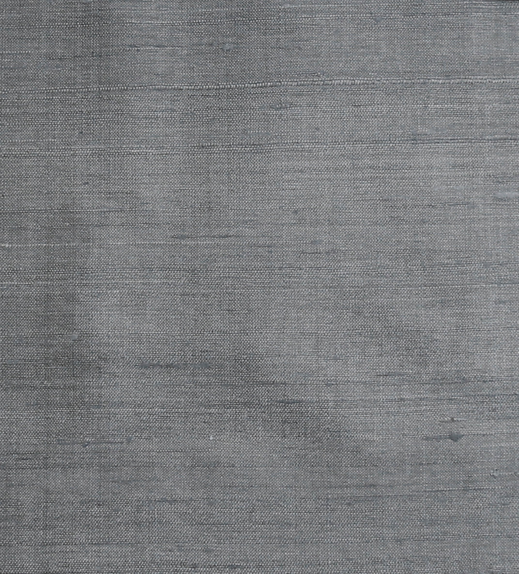 Grey silk upholstery fabric in a plain, even colour
