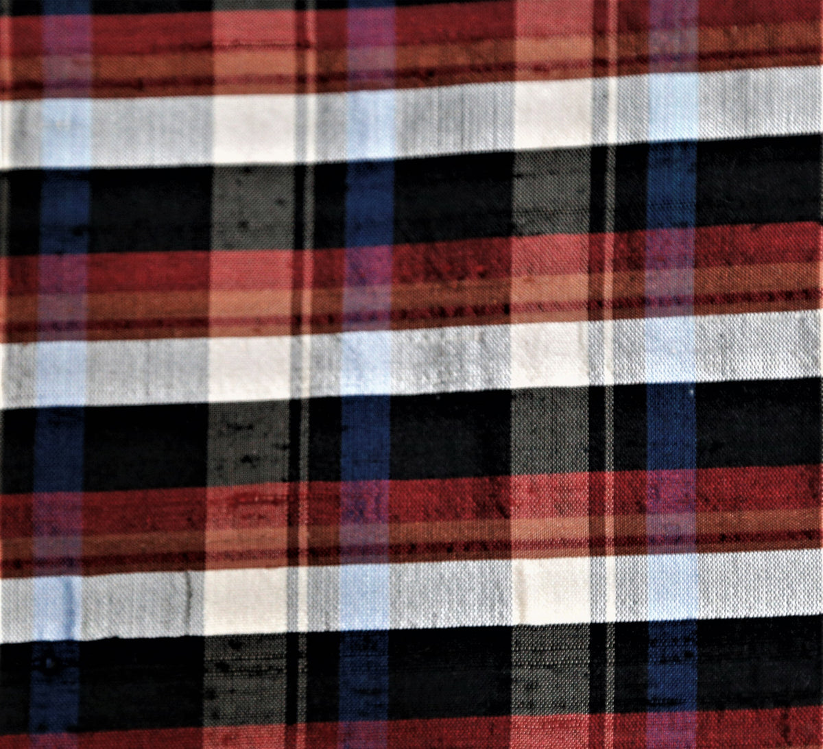 Dupion silk check fabric in rust, cream, black, and navy windowpane stripes