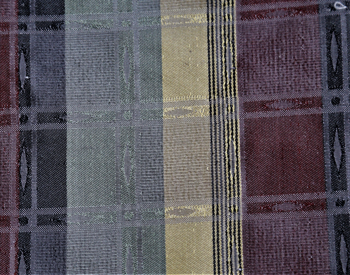 Dupion jacquard silk fabric in vertical slate-blue, gold, black, and maroon colour-block stripes