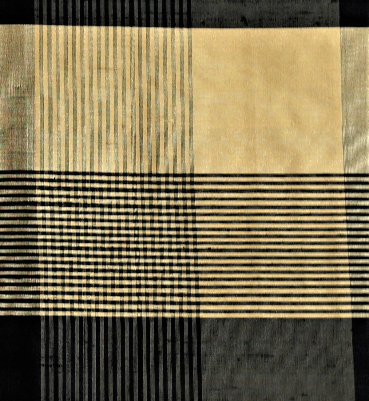 Topaz check silk fabric in black and gold alternating windowpane check with fine pinstripe texture