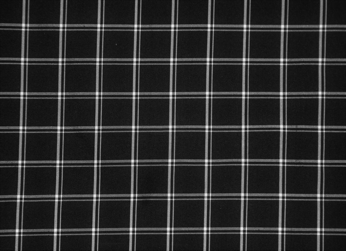 Black and white polysilk upholstery fabric in a fine windowpane pinstripe check