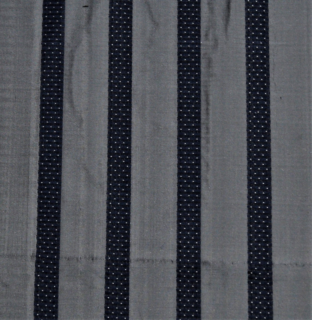 Grey silk upholstery fabric with a navy dotted pinstripe