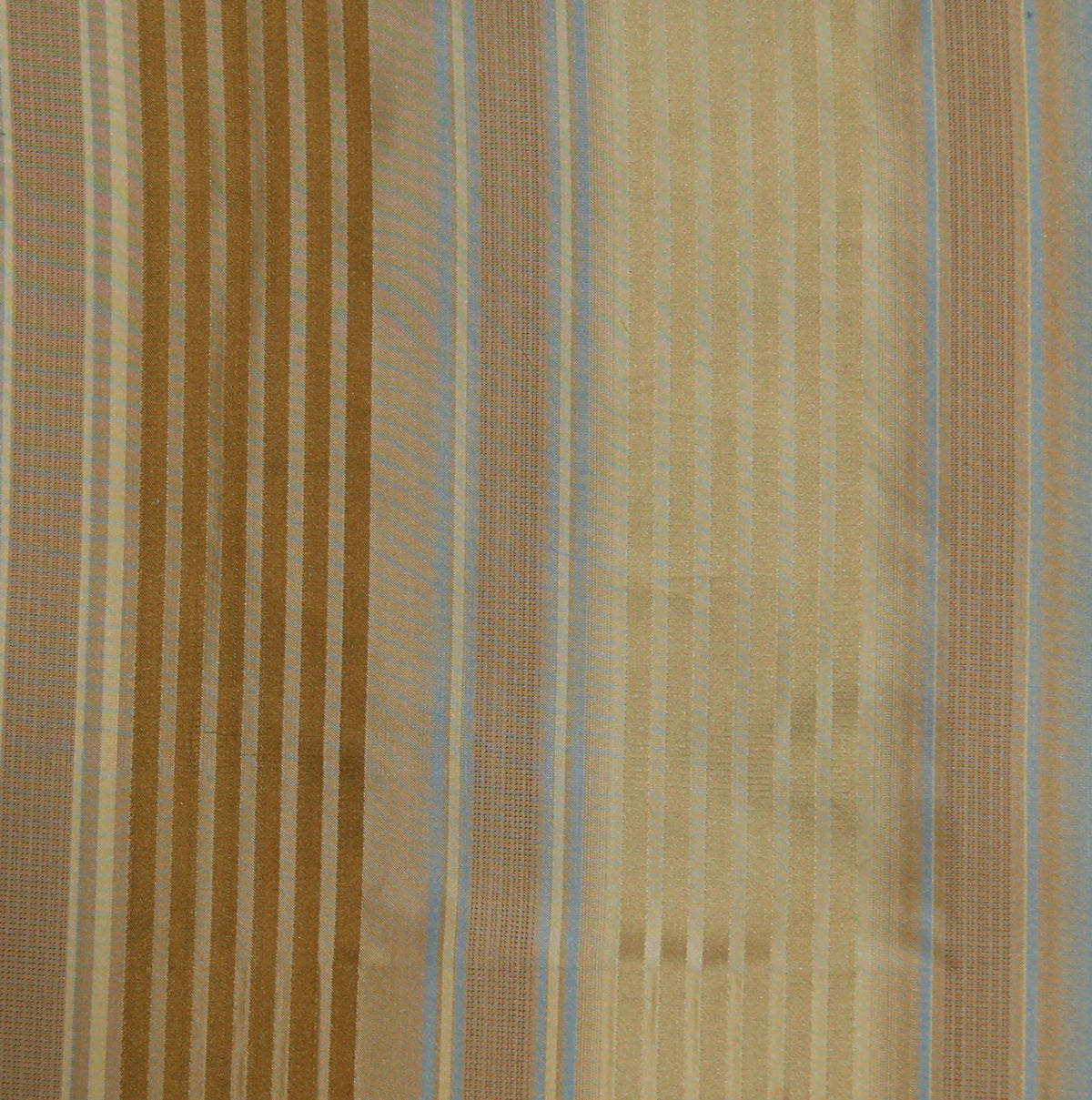 Brown, tan, and pale blue satin upholstery fabric in a multi-stripe weave