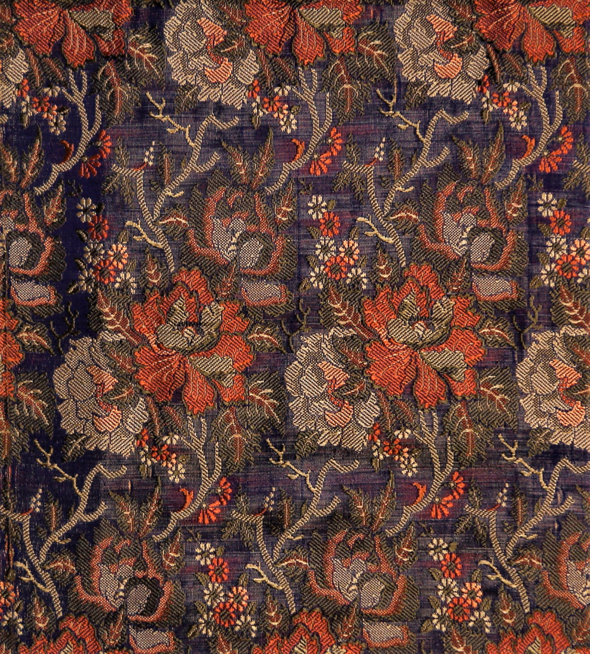 Navy polysilk upholstery fabric with a coral-orange and cream floral brocade