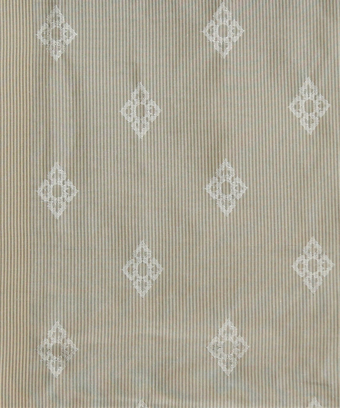 Beige silk upholstery fabric with white embroidered diamond medallions on a fine pinstripe