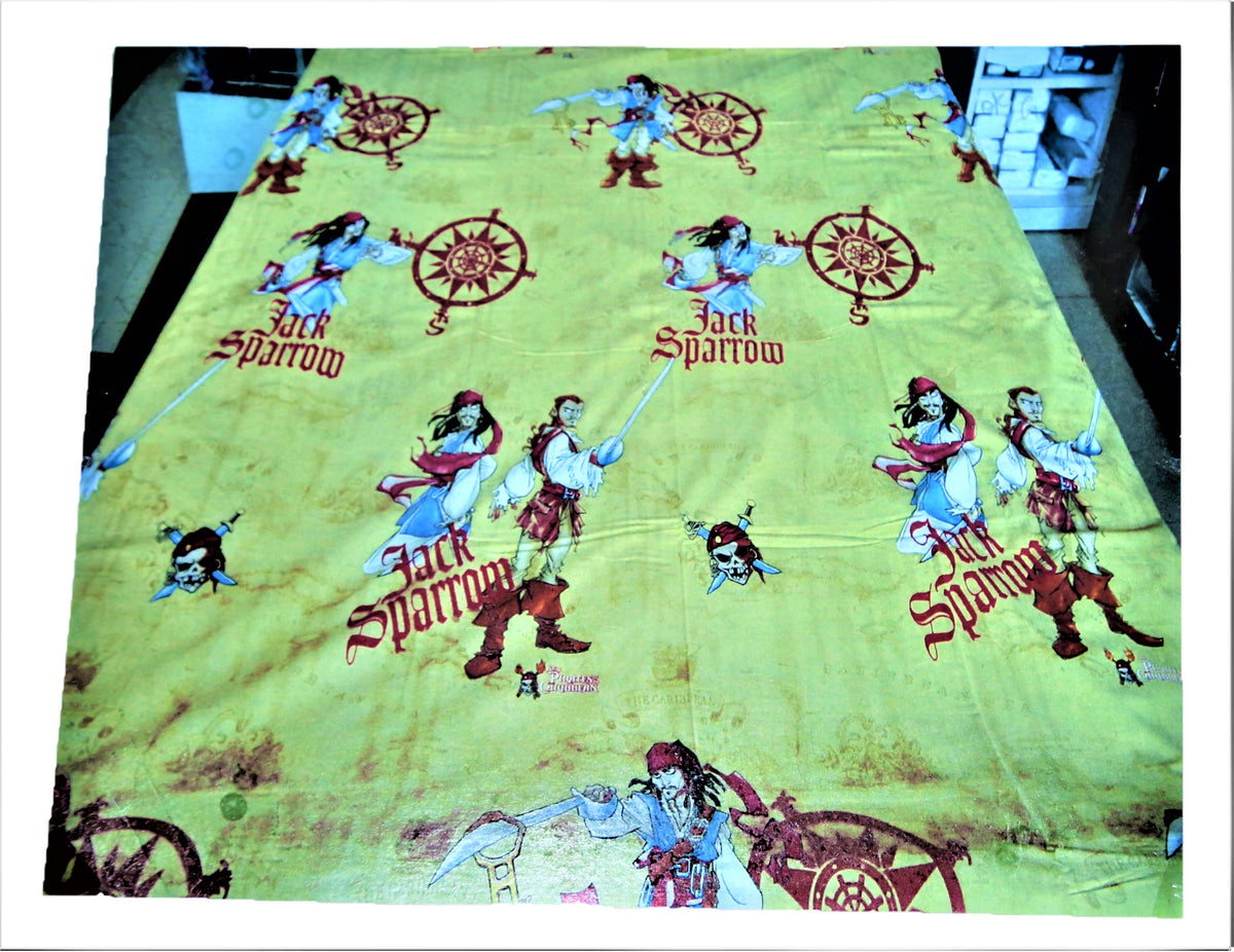 Golden yellow cotton duvet cover with a pirate adventure character print