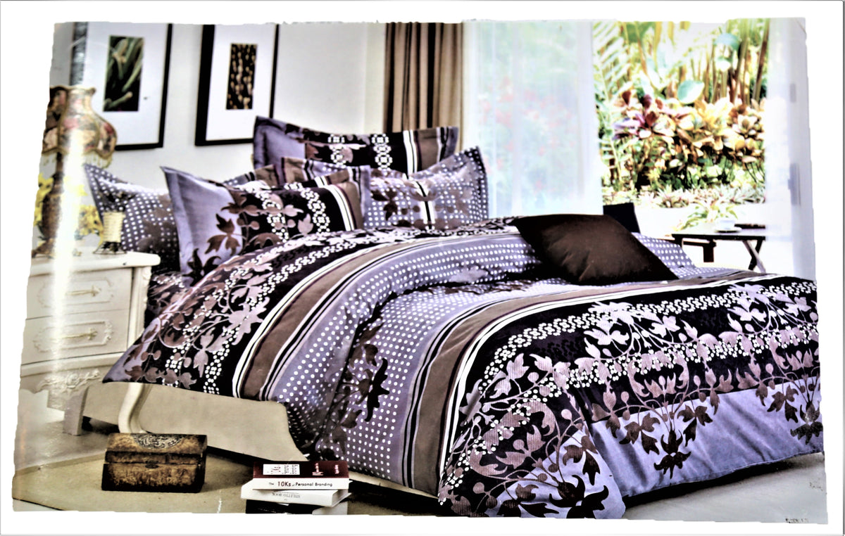 Grey, black and mauve floral and polka-dot striped print bedsheet and duvet set, styled on a bed with matching pillows