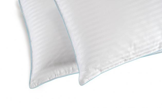 Close-up of the piped corner of the white satin stripe Regent pillow