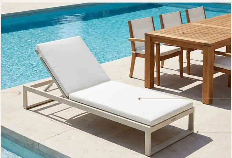Outdoor lounge furniture on a sunlit terrace